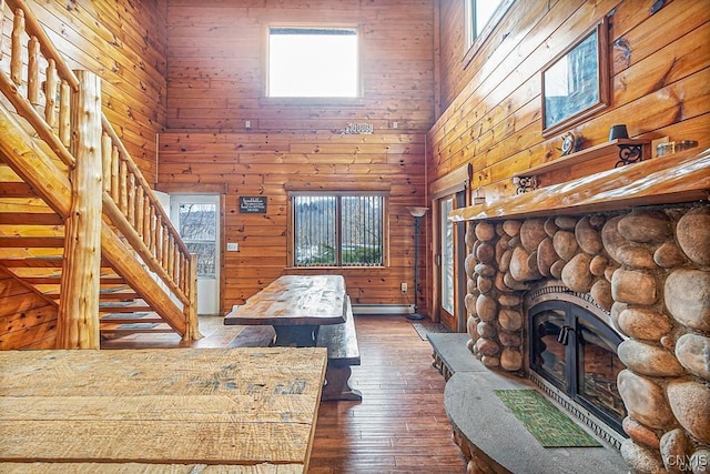 3391 State Route 28, Herkimer, NY 13350 - living room with stairs, dark wood-type flooring, a fireplace, and plenty of natural light