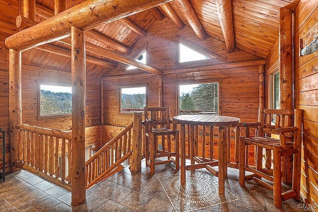 3391 State Route 28, Herkimer, NY 13350 - interior space featuring vaulted ceiling with beams, wood walls, and a wealth of natural light