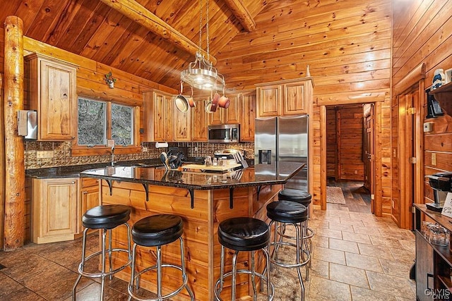 3391 State Route 28, Herkimer, NY 13350 - kitchen with wooden ceiling, appliances with stainless steel finishes, a kitchen breakfast bar, a center island, and backsplash