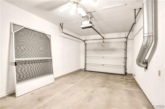 garage featuring a garage door opener