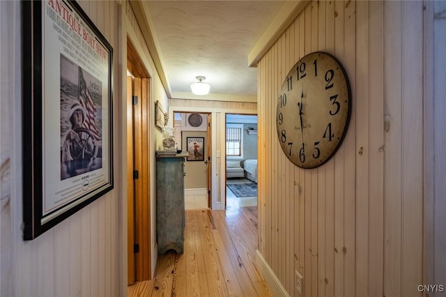 corridor with light wood-style floors