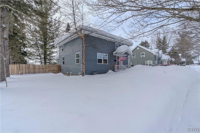 view of front of house with fence