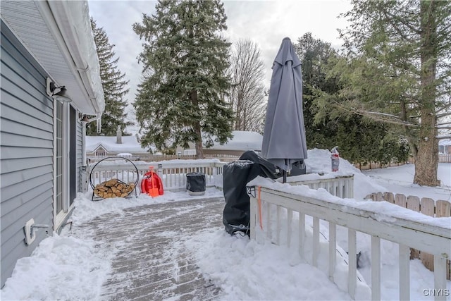 view of snow covered deck