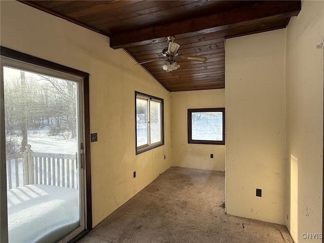 interior space featuring wooden ceiling, vaulted ceiling with beams, and ceiling fan