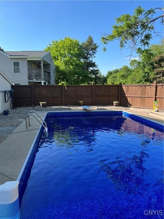 view of pool with a fenced backyard and a fenced in pool