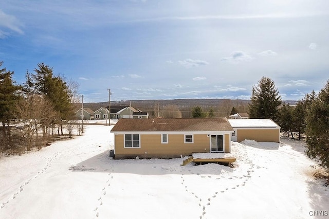 view of snow covered property