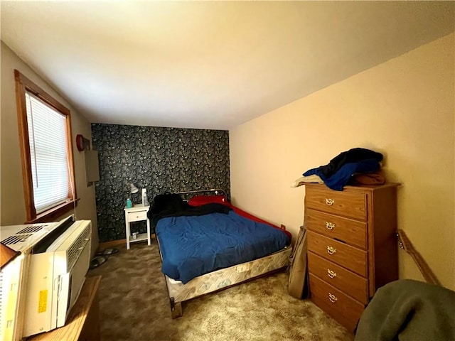 bedroom with dark carpet