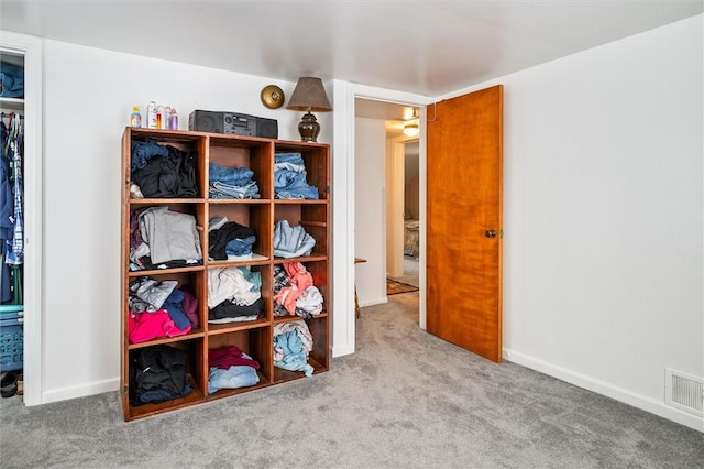 interior space featuring visible vents and baseboards