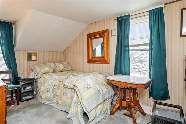 carpeted bedroom featuring vaulted ceiling