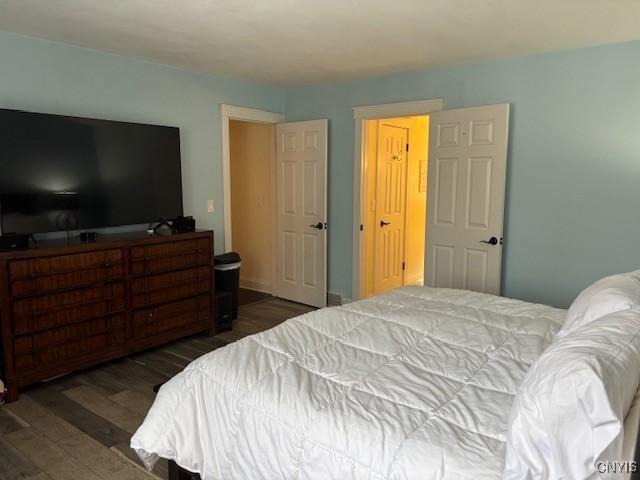 bedroom featuring wood finished floors