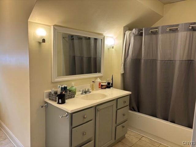 full bath featuring shower / tub combo, vanity, and tile patterned floors