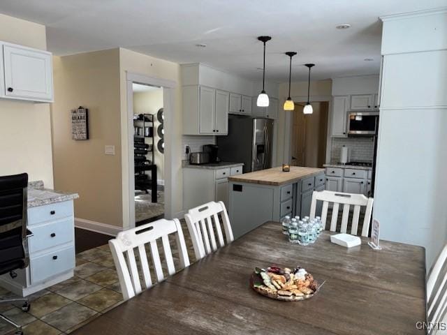 dining area with baseboards