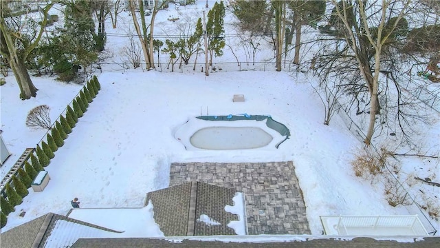 view of yard covered in snow