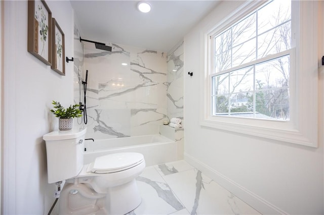 bathroom featuring shower / bathtub combination, marble finish floor, toilet, and baseboards