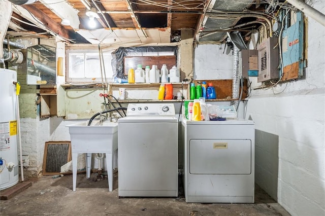 laundry area featuring water heater, laundry area, and separate washer and dryer