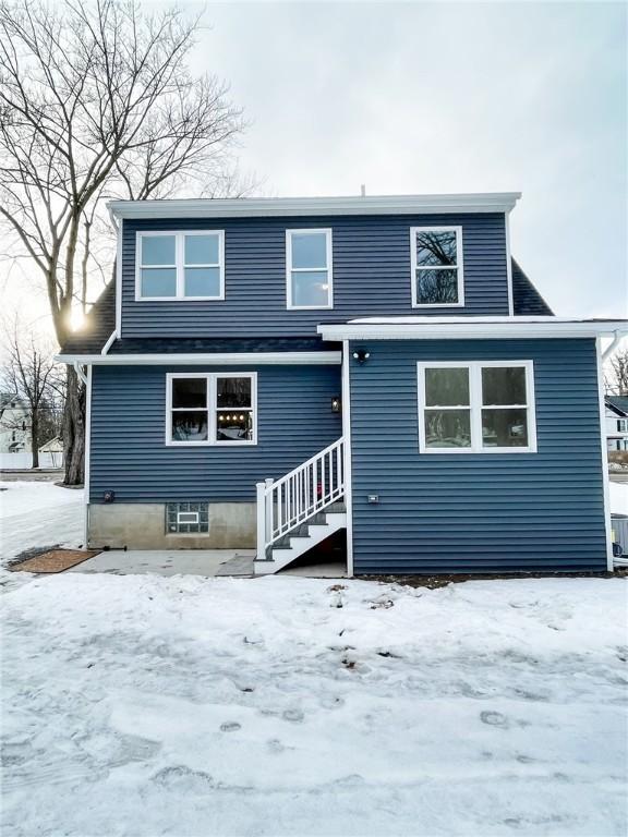 view of snow covered house