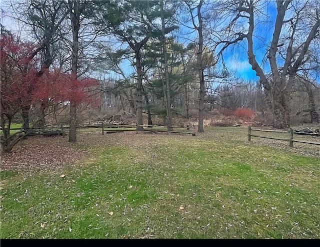 view of yard featuring fence