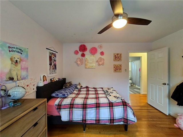 bedroom featuring a ceiling fan and wood finished floors