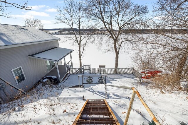 view of snow covered deck