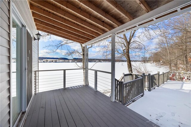 view of snow covered deck