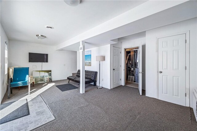 interior space featuring carpet floors and visible vents