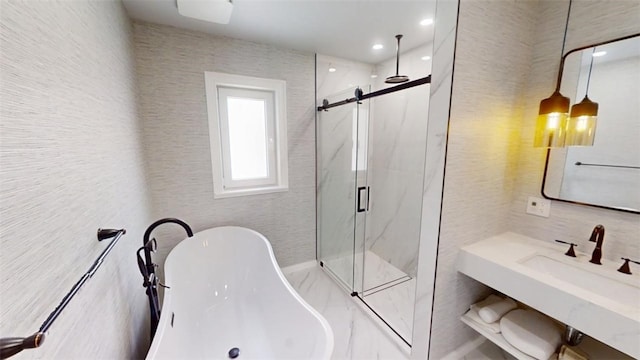 bathroom with a soaking tub, a marble finish shower, tile walls, and recessed lighting