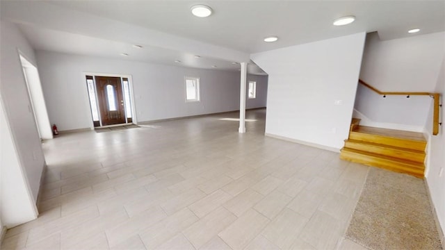 274 Reservoir Hill Rd, Plymouth, NY 13815 - unfurnished living room featuring stairs, decorative columns, and recessed lighting