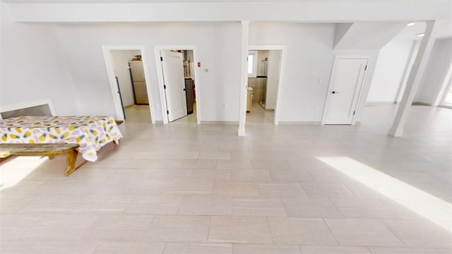 274 Reservoir Hill Rd, Plymouth, NY 13815 - bedroom featuring a walk in closet and baseboards