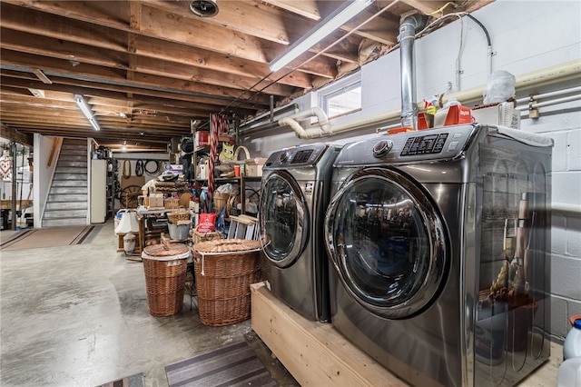 washroom featuring laundry area and washer and dryer