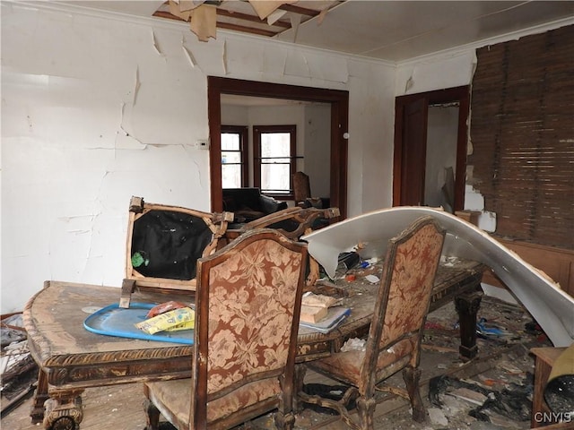 dining area featuring ornamental molding