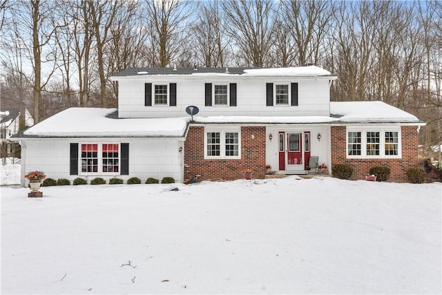 traditional home with brick siding