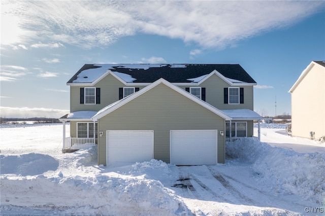 traditional-style home featuring a garage