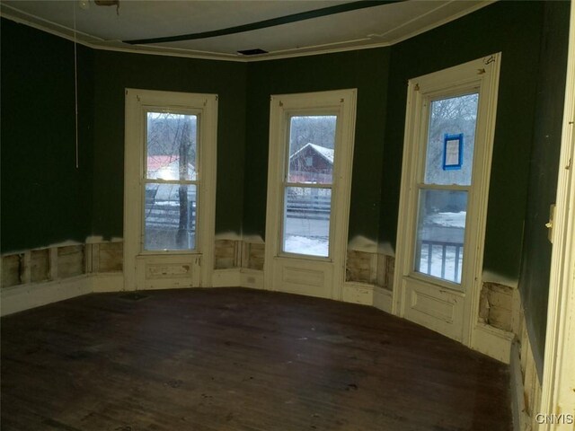 doorway to outside with wood finished floors