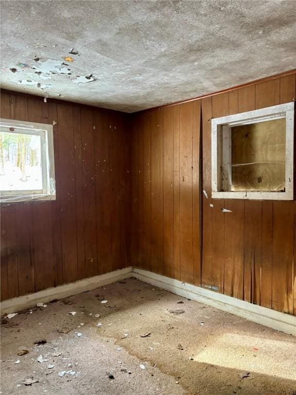 empty room with a textured ceiling