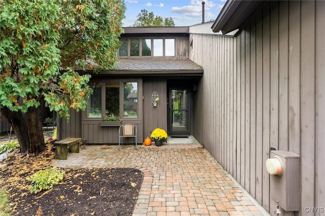 doorway to property with a patio