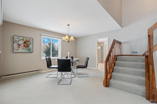 dining room featuring a notable chandelier, a baseboard heating unit, carpet flooring, visible vents, and stairs