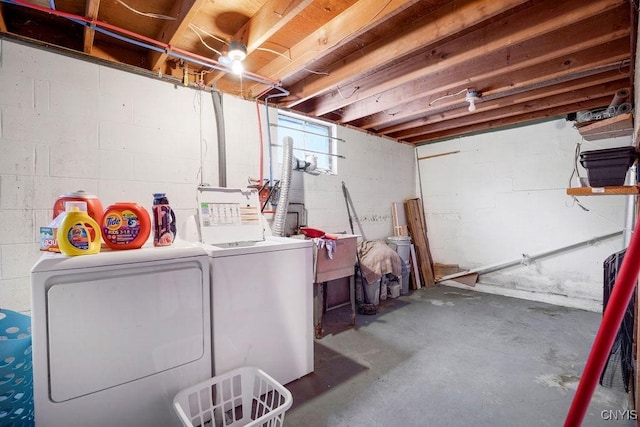 basement featuring washing machine and dryer