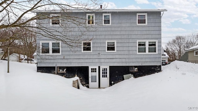 view of snow covered property