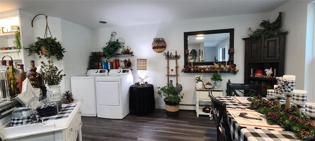 interior space featuring tile countertops, baseboard heating, washing machine and dryer, and dark wood finished floors