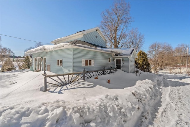 view of snow covered property