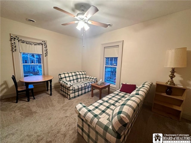 bedroom featuring ceiling fan, carpet floors, visible vents, and baseboards