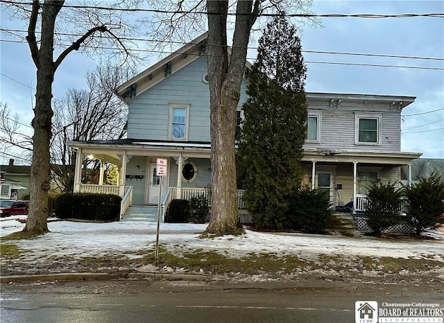 italianate-style house with covered porch