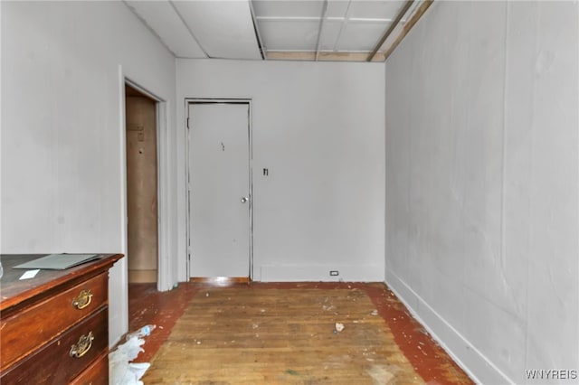 dining space with wood finished floors