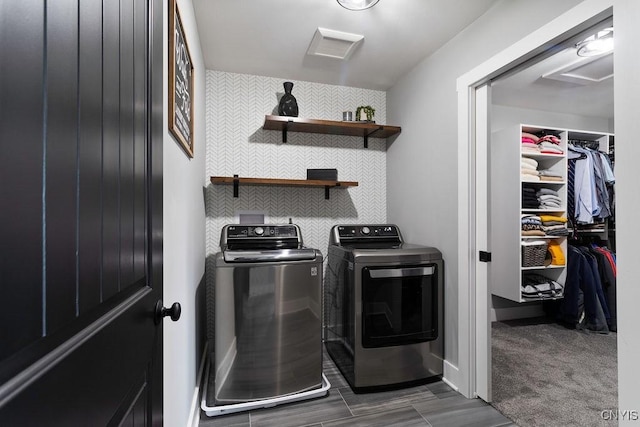 laundry area featuring attic access, washer and dryer, laundry area, and baseboards