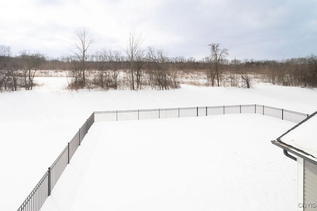 view of yard layered in snow