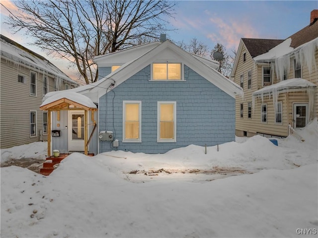 view of snow covered house