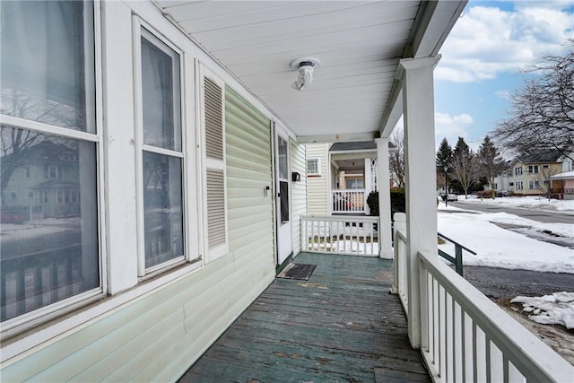 wooden terrace featuring a porch