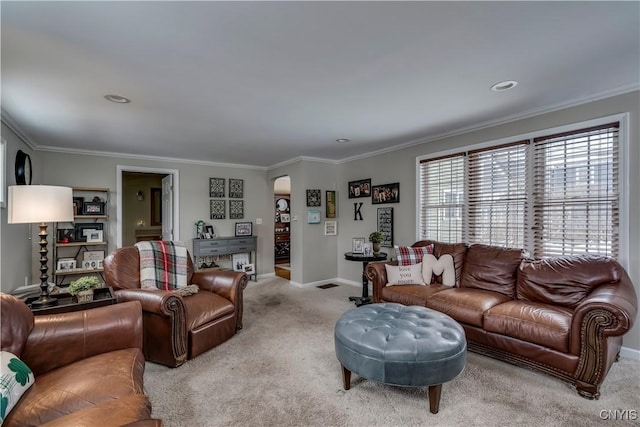 living area featuring light carpet, baseboards, and crown molding