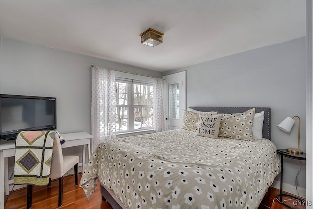 bedroom featuring wood finished floors