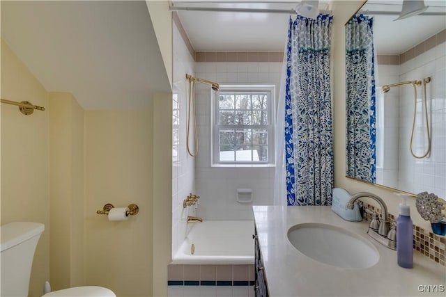 bathroom featuring toilet and vanity